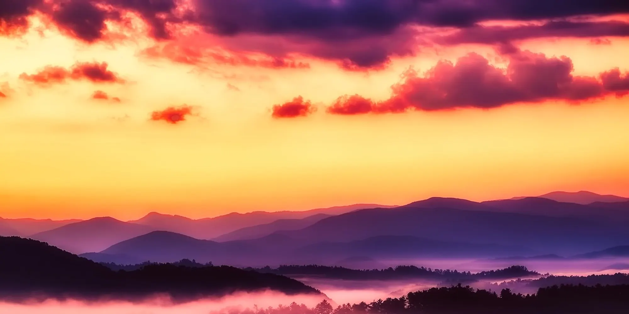 Sunrise over layered ridges and valley fog in Great Smoky Mountains National Park, Tennessee